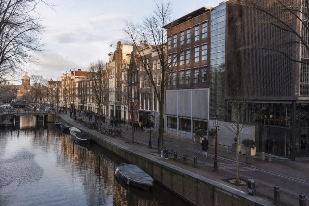Low winter sun across the rooftops near Anne Frank House