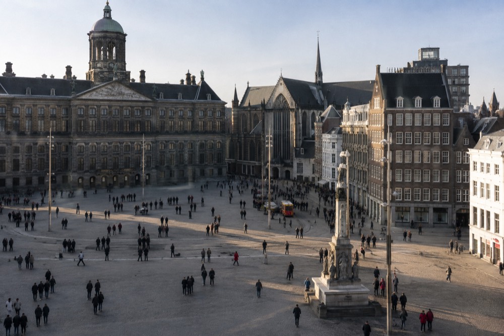 The frontage of Dam Square viewed from the opposite bank