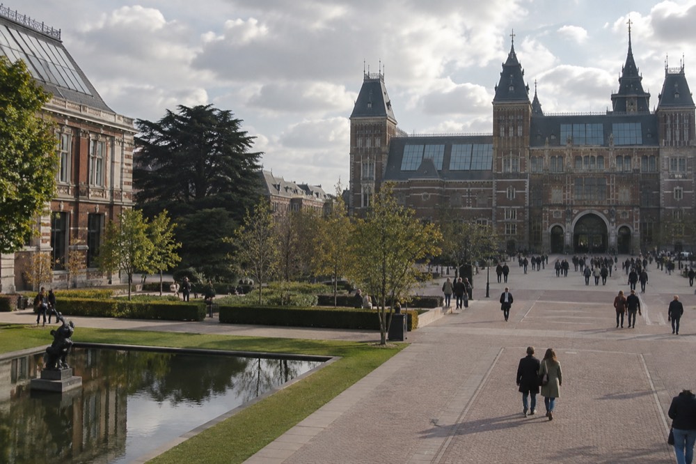 A quiet corner of Museum Quarter with trees overhanging the water