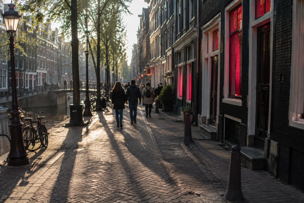 The waterfront near Red Light District under a broad grey northern sky