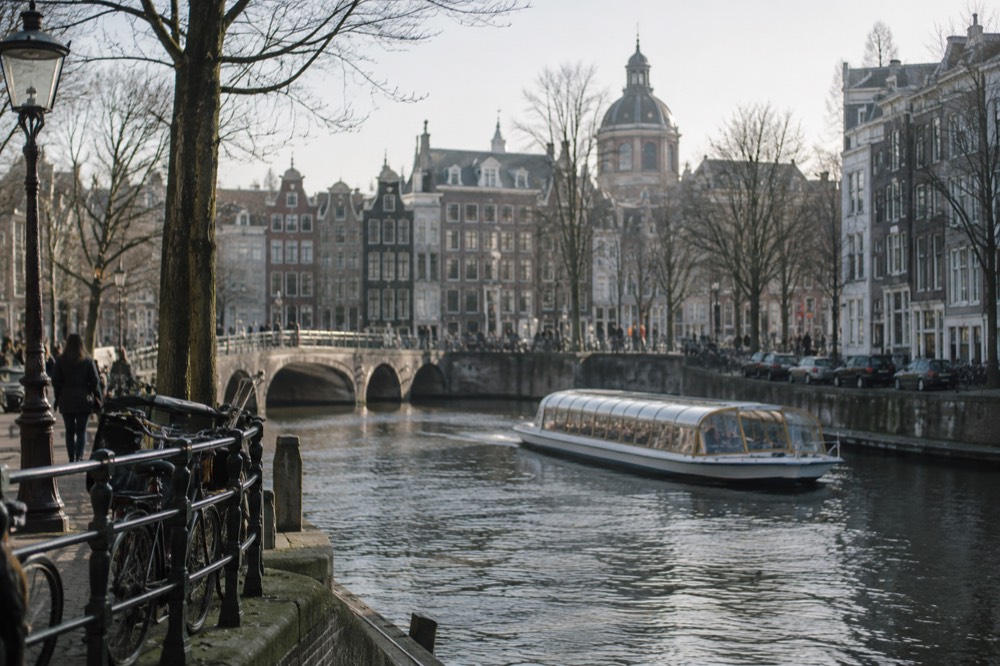 The frontage of Dam Square viewed from the opposite bank