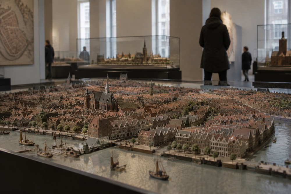 Gallery interior of the Amsterdam Museum with historical city models on display