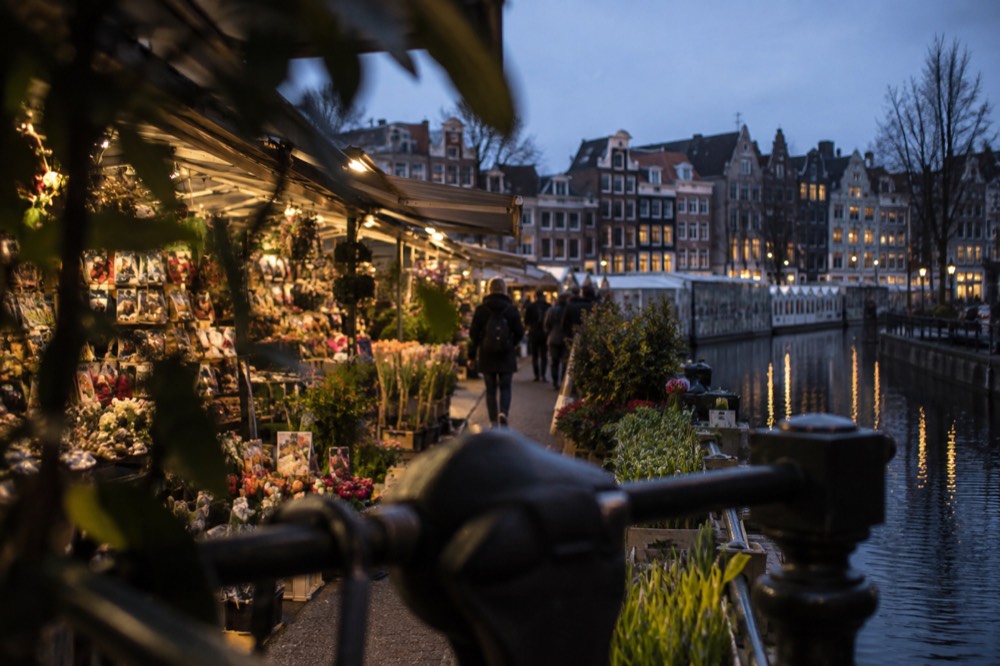 A narrow side street leading away from Bloemenmarkt
