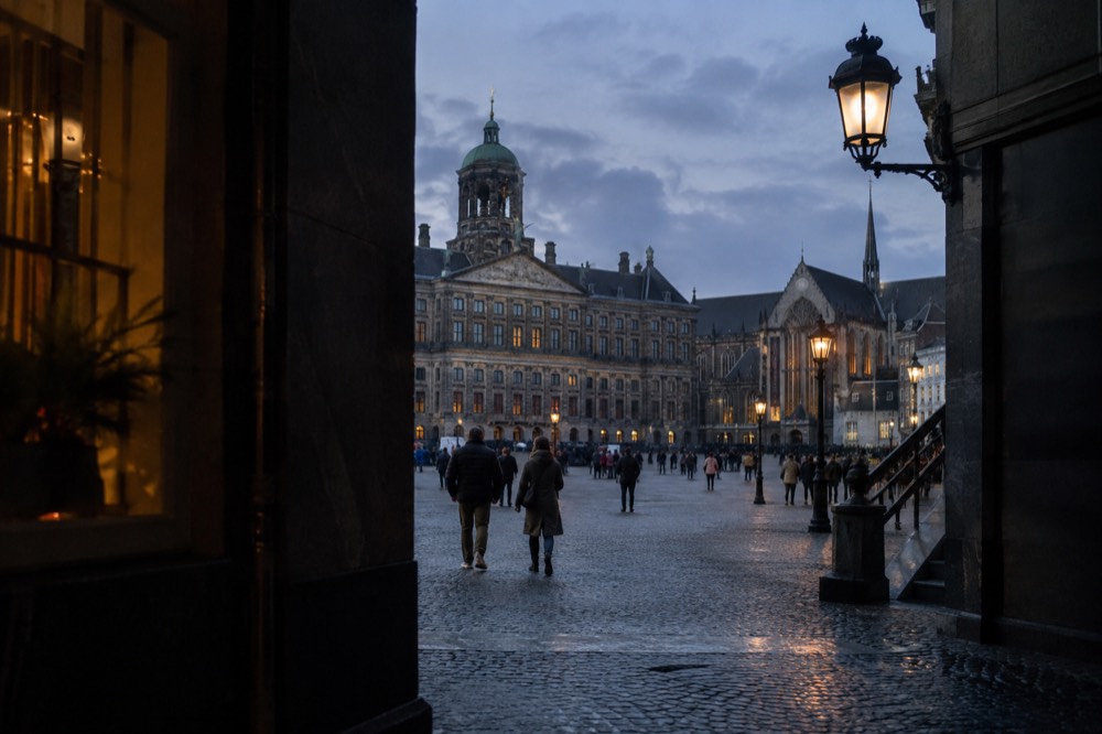 Low winter sun across the rooftops near Dam Square