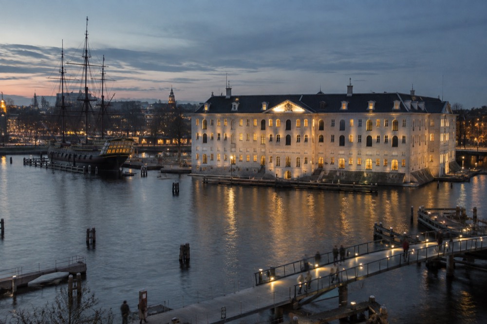 A wide view across the water towards Scheepvaartmuseum