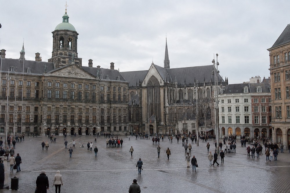 The frontage of Dam Square viewed from the opposite bank
