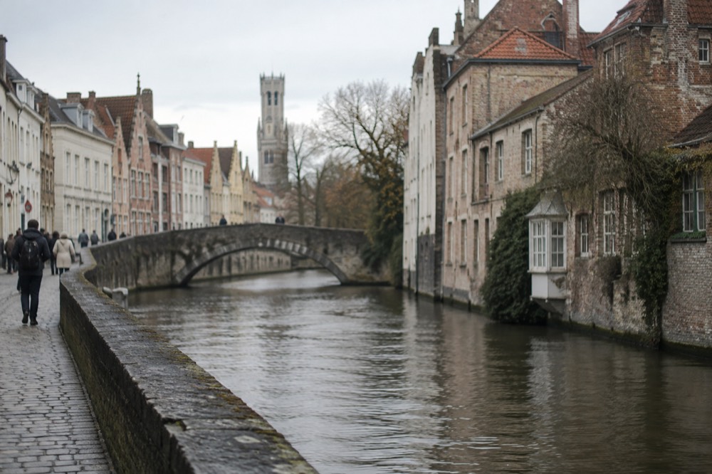 A narrow side street leading away from Bruges