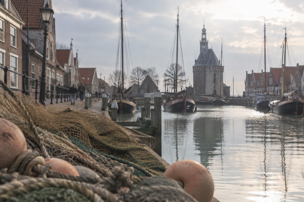 The waterfront near Enkhuizen under a broad grey northern sky