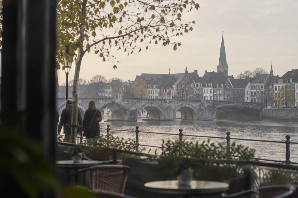 A canal bridge and moored boats close to Maastricht
