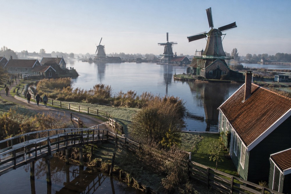The approach to Zaanse Schans, with bicycles leaning against the railings
