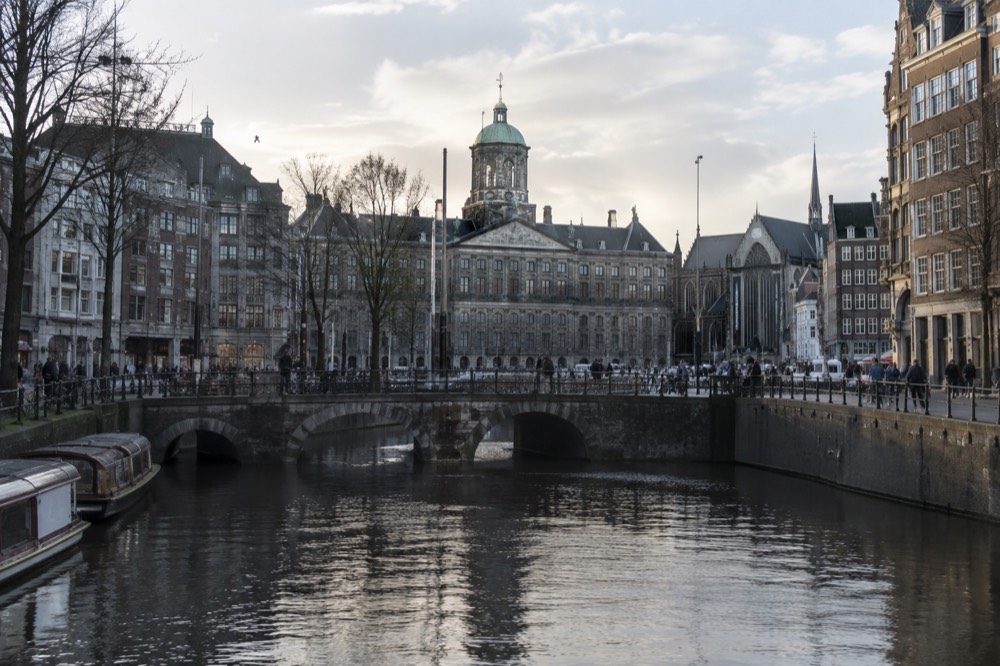 The frontage of Dam Square viewed from the opposite bank