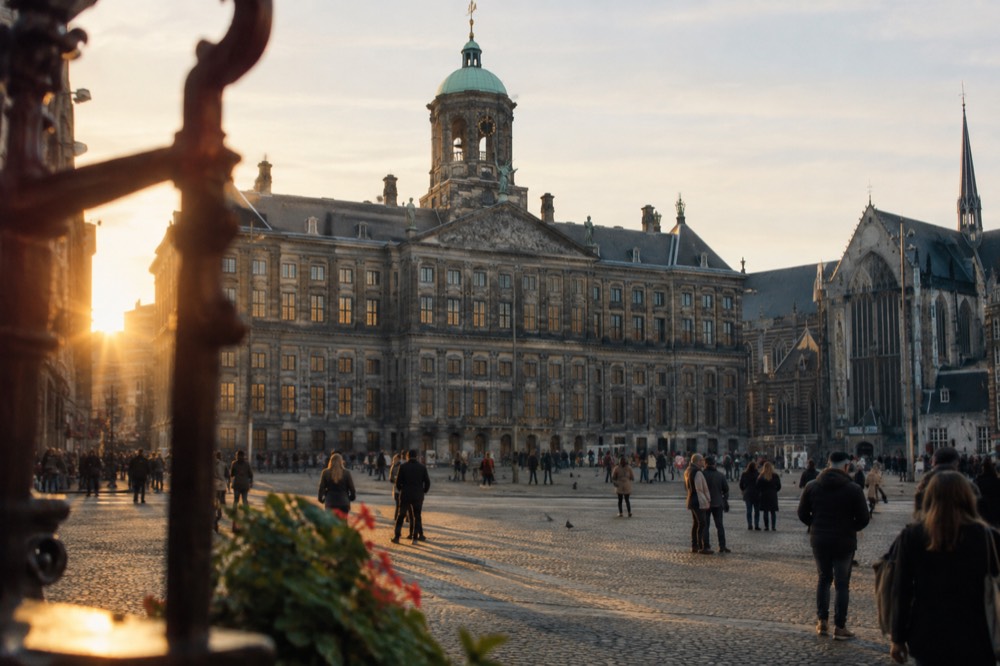 A canal bridge and moored boats close to Dam Square