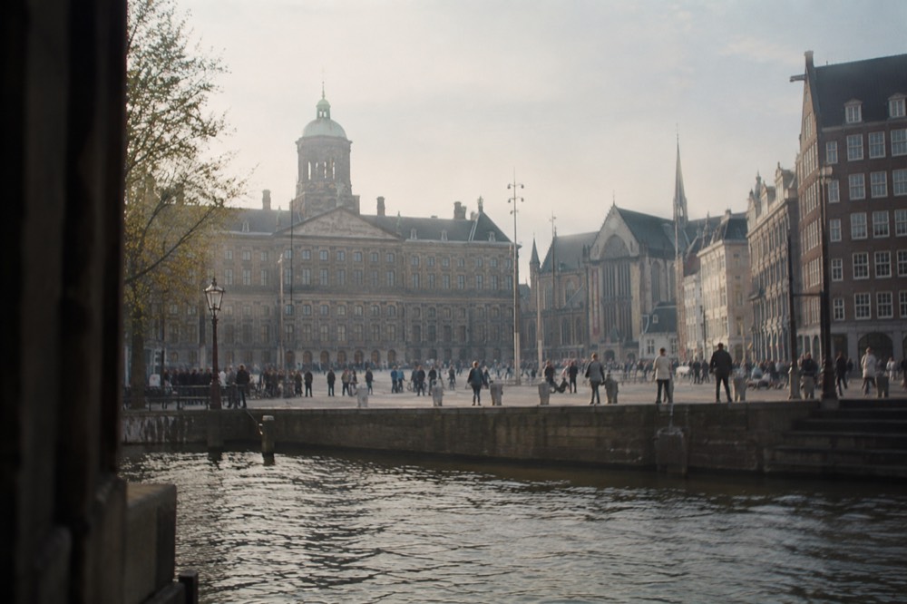 The frontage of Dam Square viewed from the opposite bank