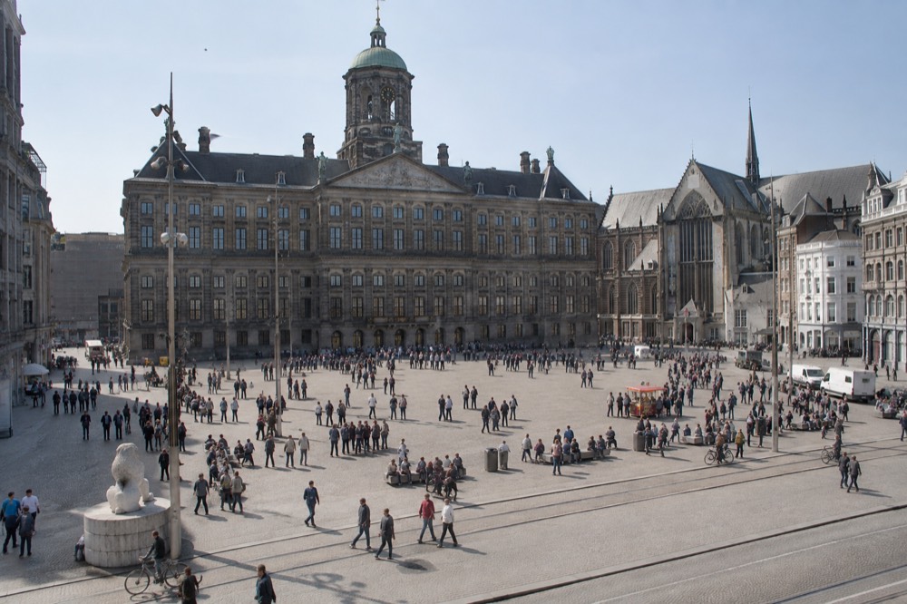 The frontage of Dam Square viewed from the opposite bank