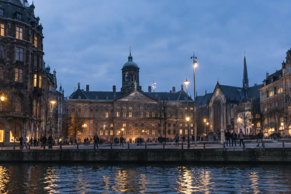 The frontage of Dam Square viewed from the opposite bank