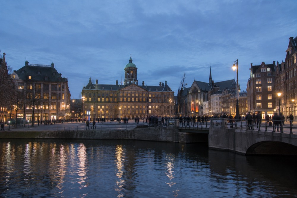 The frontage of Dam Square viewed from the opposite bank